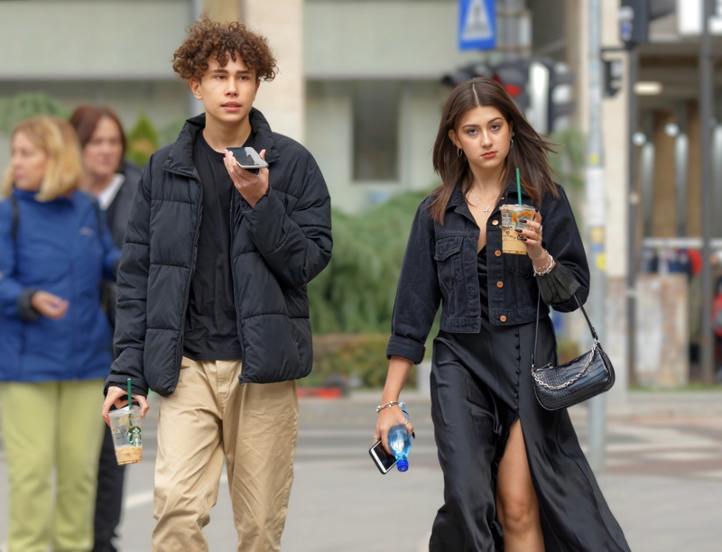 17 - Couple walking in an urban setting